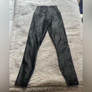 Shiny black leggings- almost look like faux leather- 23 inch inseam.